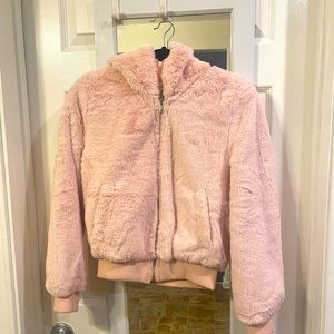 Like new. Never worn. Faux fur sweater plush pink